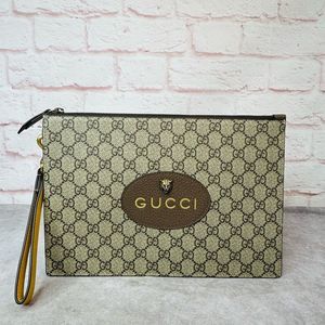 Gucci Brown Monogram Wristlet Clutch with Gold Logo